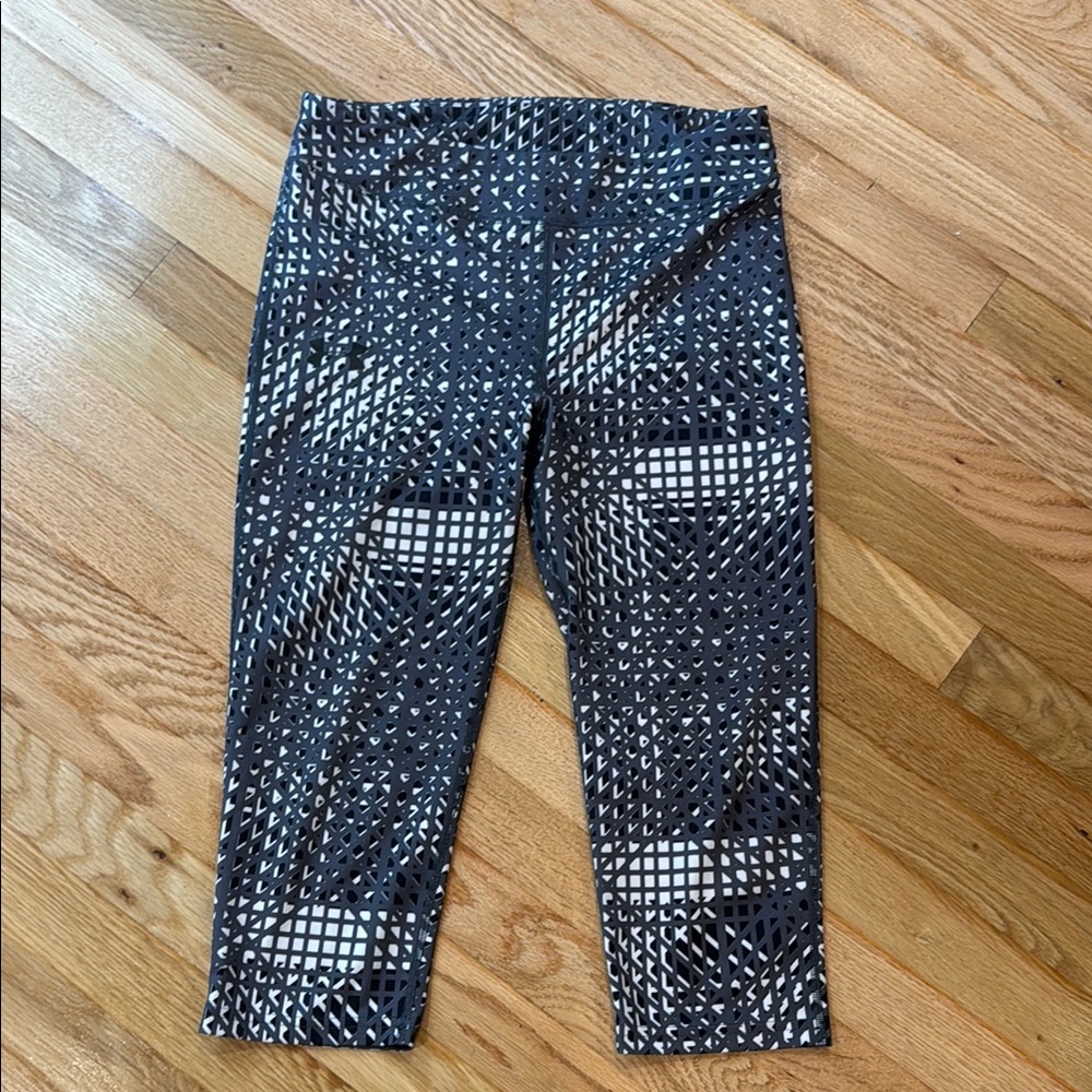 Under Armour Black and White Capri Leggings with Striking Design
